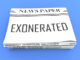 Newspaper with EXONERATED headline on the front page.