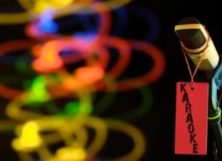 Microphone with "Karaoke" tag, colorful lights in background.