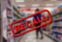 Recall text over blurred supermarket background.