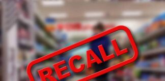 Recall text over blurred supermarket background.