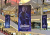 Mall with Avengers: Endgame banners featuring Hawkeye.