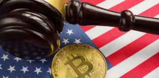 Gavel and Bitcoin on American flag background.