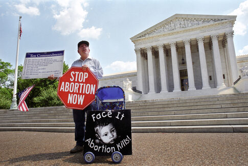 Person protesting abortion outside the United States Supreme Court.