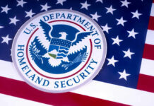US Homeland Security emblem over American flag