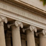 The Treasury Department building with columns and architectural details.