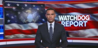 News anchor presenting a report in front of an American flag backdrop