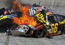 NASCAR car crash with fire on racetrack
