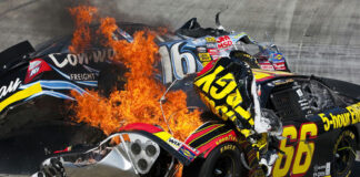NASCAR car crash with fire on racetrack