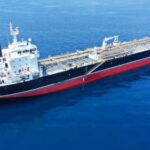 Oil tanker ship sailing on calm blue sea