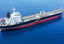 The Russia Oil Standoff Escalates Oil tanker ship sailing on calm blue sea