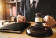 No Evidence, All Hype: JFK Jr. Fantasy Judge with gavel striking sound block