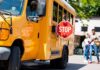Can the 104 MPH School Bus Story Be Proven? School bus with extended stop sign near students on sidewalk