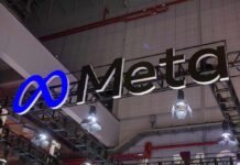 Meta logo sign hanging at a trade show booth