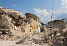 Israel’s Safe Zone Strategy Under Scrutiny Rubble from collapsed buildings in earthquake-hit area. Clear sky.