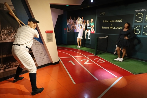 12-31-2023:,San,Francisco,,California:,Madam,Tussaid,Wax,Museum,San,Francisco, Wax figures of a baseball player and Serena Williams in a sports museum setting