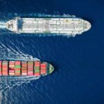 Iran Says It Will Stop All Regional Oil — If Strikes Continue Two cargo ships navigating through the ocean
