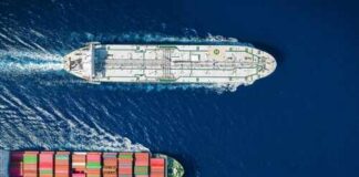 Two cargo ships navigating through the ocean