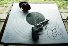 A Search for a Stolen Bike Ended in Tragedy Revolver and ear protection on paper shooting target