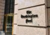 Post Ordered to Reinstate Fired Columnist The Washington Post building entrance with logo on stone wall