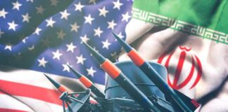 Missile launchers in front of U.S. and Iranian flags