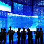 Microsoft Just Won the AI Race—for Now Silhouetted business professionals in front of digital stock market displays