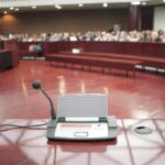One Holdout Forced A High Profile Mistrial Conference microphone on a podium in a courtroom