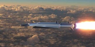 Hypersonic missile flying above clouds with bright exhaust flame