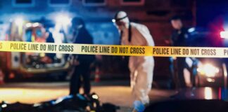 Police tape at nighttime crime scene