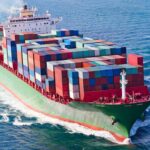 Rescue Or Ransom? Somalia Split Erupts A large cargo ship loaded with colorful containers sailing on the ocean