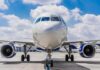 Smoke Column Exposes Air Defense Gaps Commercial airplane on runway, front view