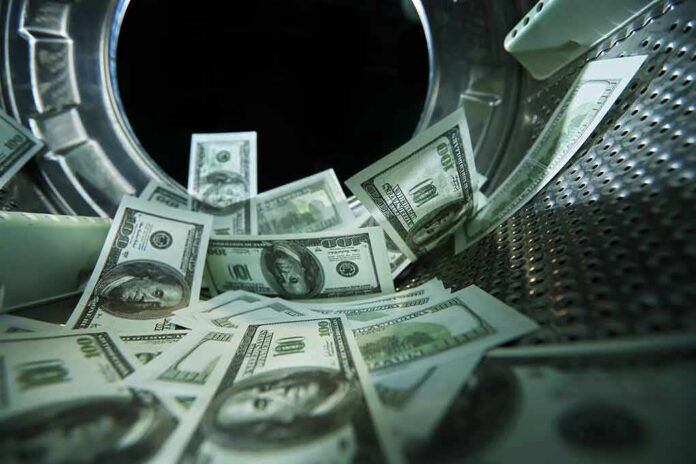 US dollar bills inside a washing machine drum