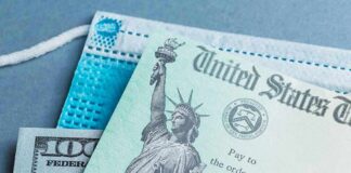 U.S. Treasury check with face mask and hundred-dollar bill