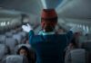 Flight Attendants Hurt – Blair Case Explodes Flight attendant giving safety demonstration in airplane aisle