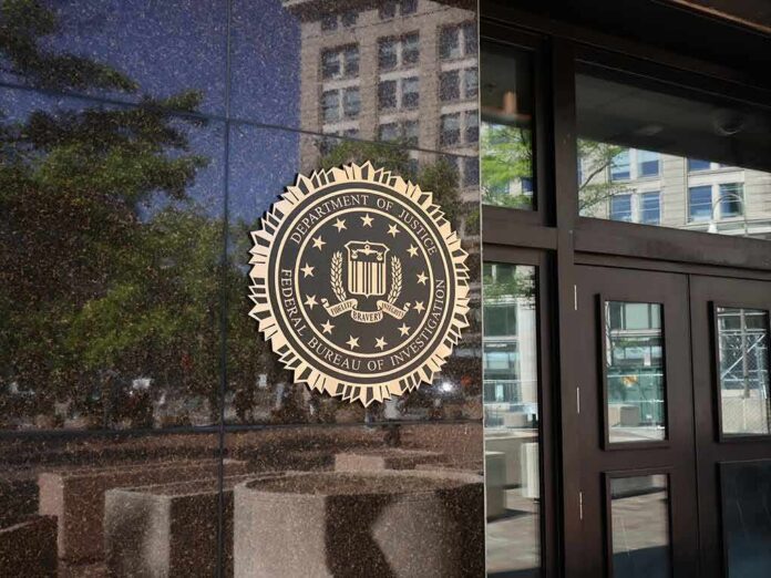 shutterstock_2154440515-1 FBI seal on a building entrance