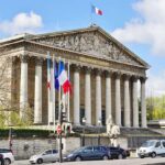 School Blockades Spread Across France Neoclassical building with columns and French flags